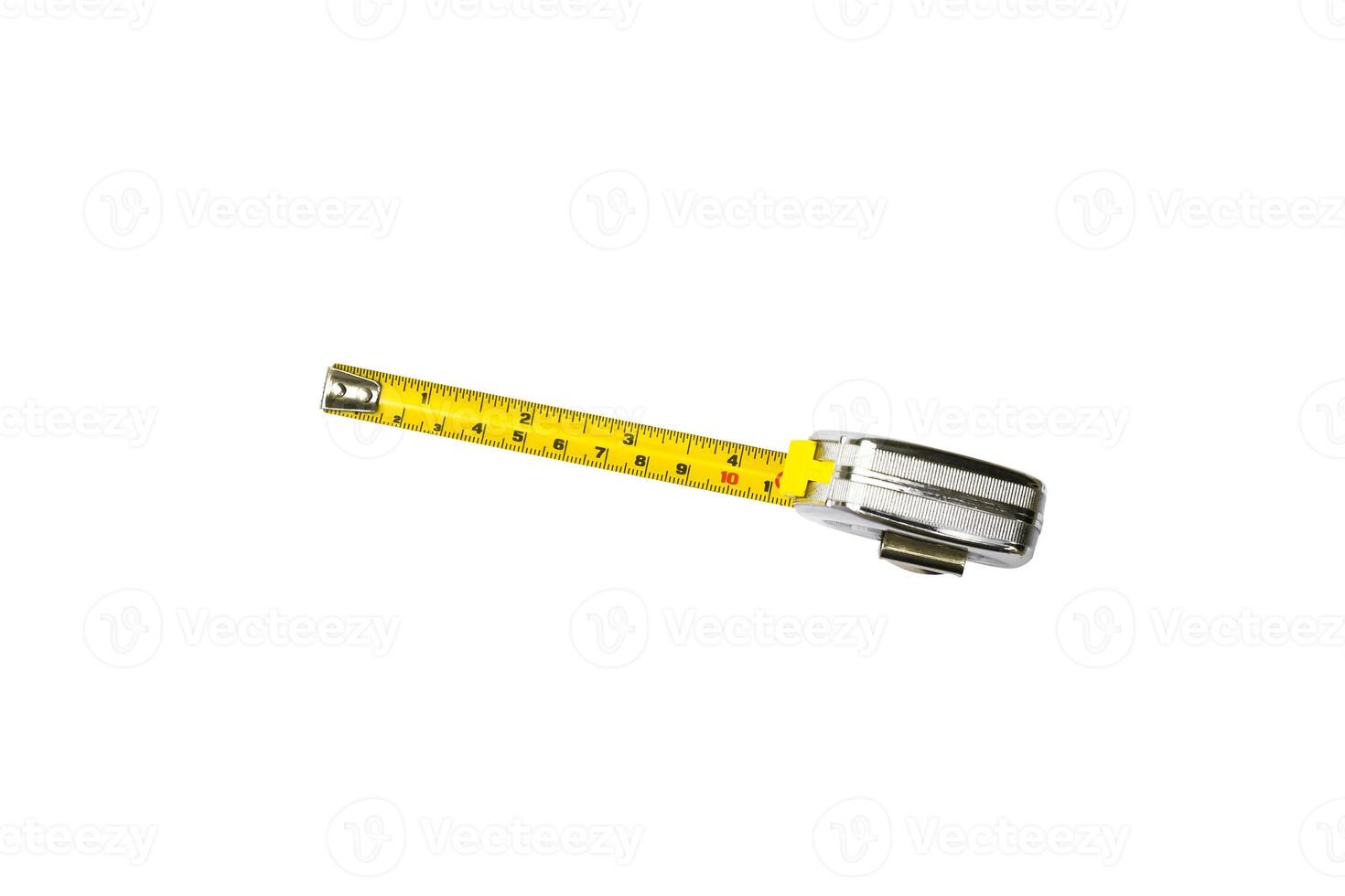 Metal measuring tape isolated on white background , Metal measuring tape with units of centimeters and inches , top view , Mechanic tools concept photo