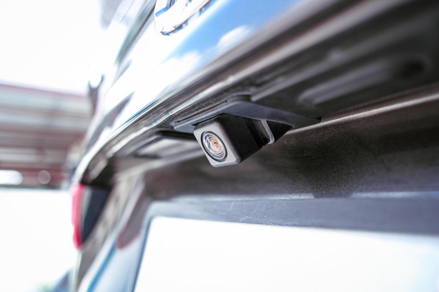 Close up of car rear view camera equipment on car trunk , Car parts concept photo