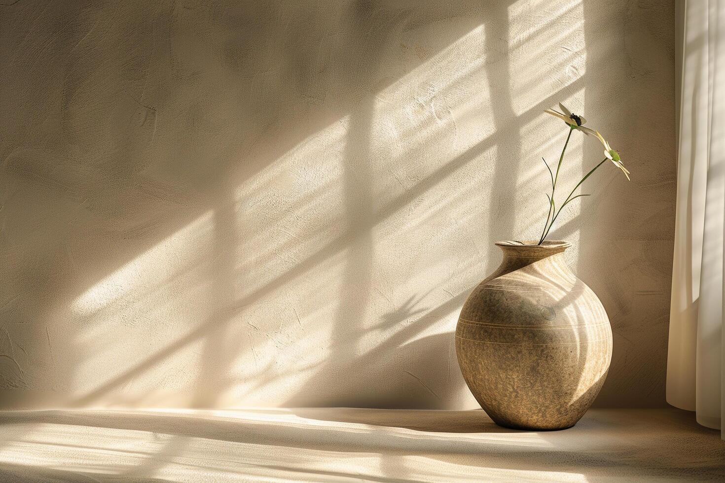 A vase with a flower in it sitting on a table photo