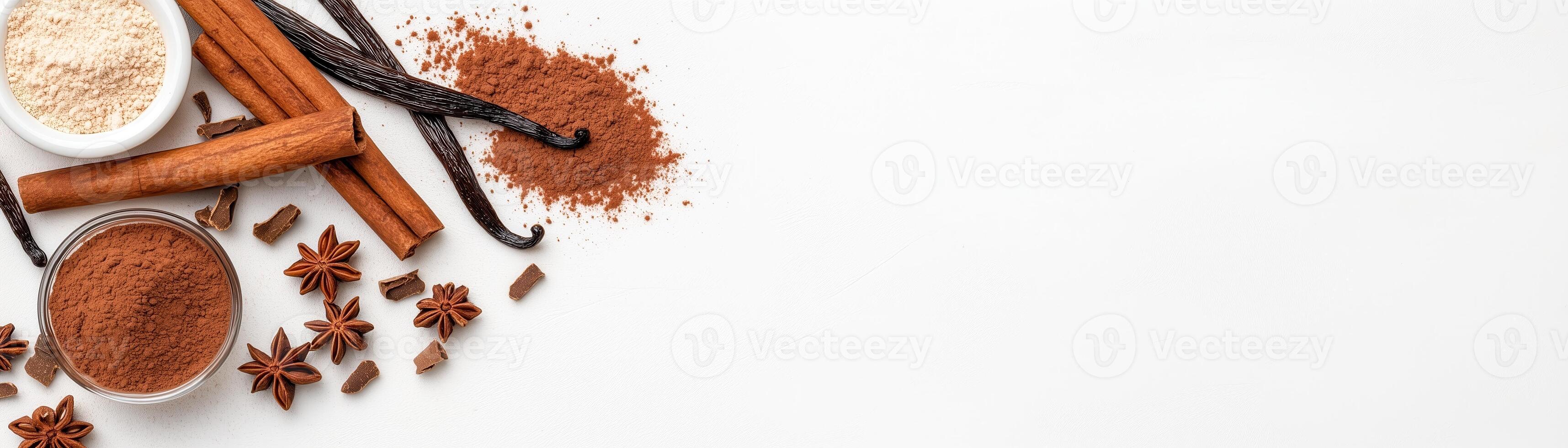 An assortment of spices and flavorings arranged on a white surface, perfect for culinary and food-related themes. photo