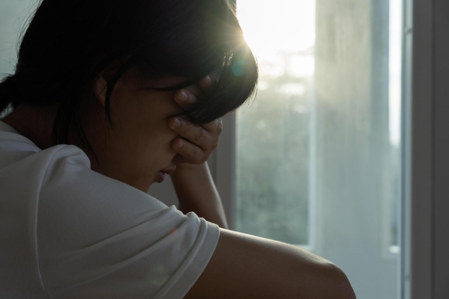 Unhappy asian woman girl disappointed, sad about problem in home alone, feel lonely, Stressed, suffering from bad relationship, break up, divorce, female confused, depression mental health, loneliness photo