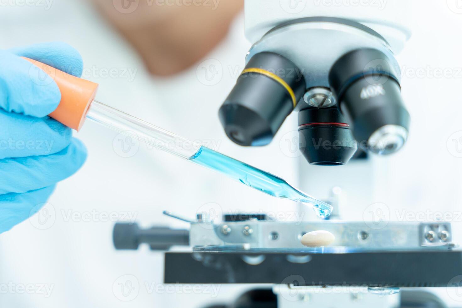 Scientist analyze biochemical samples in advanced scientific laboratory. Medical professional use dropper mix microbiological developmental of viral. Biotechnology research in science lab. cosmeti photo