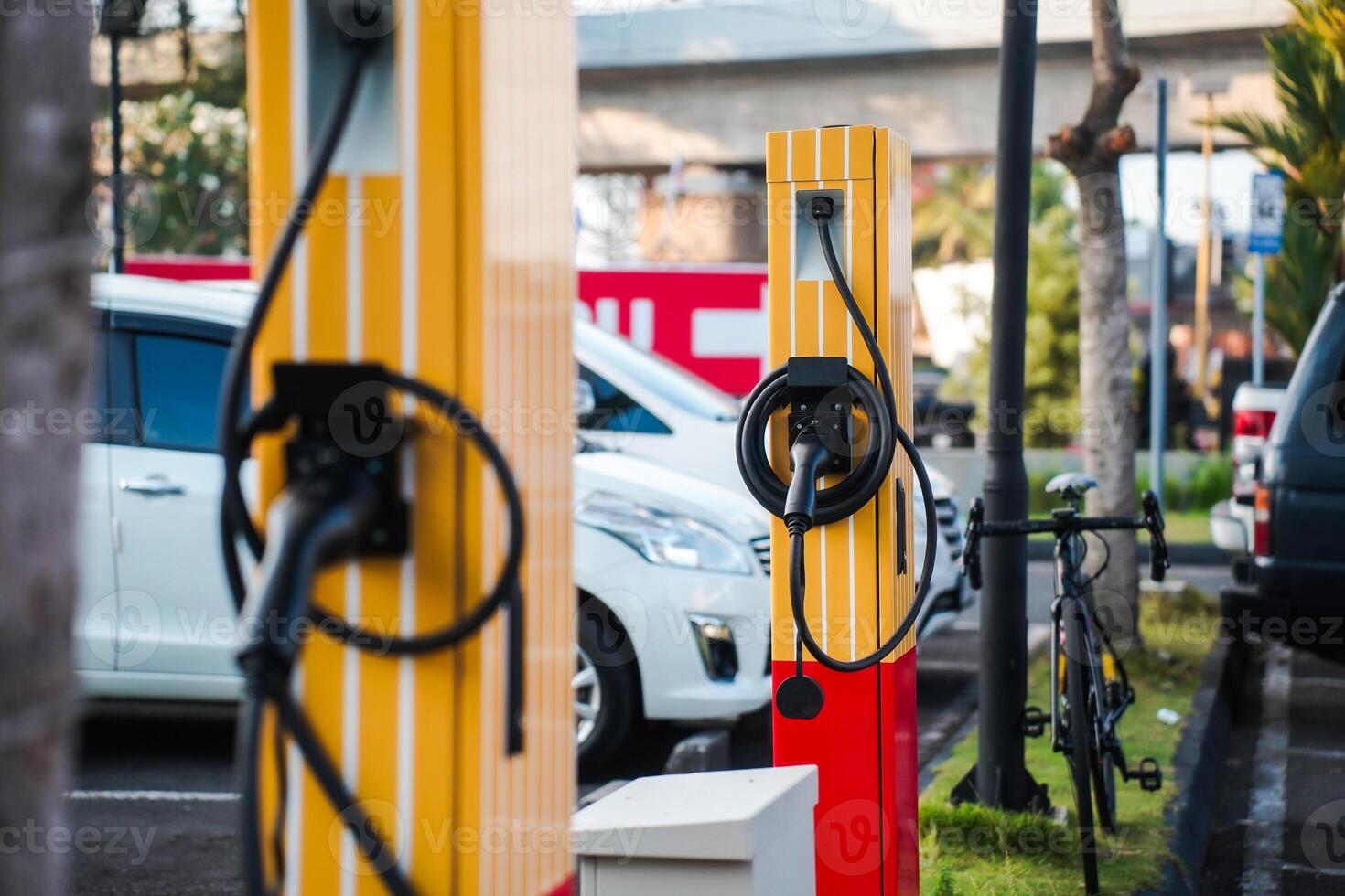 Charging stations for electric vehicles in fast food restaurant parking lots photo