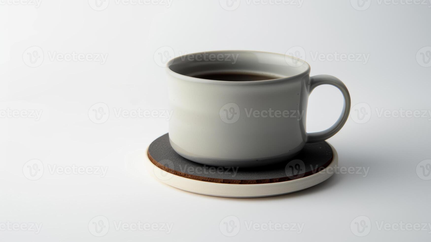 Modern coaster adds a cozy and stylish touch to a steaming cup of coffee photo