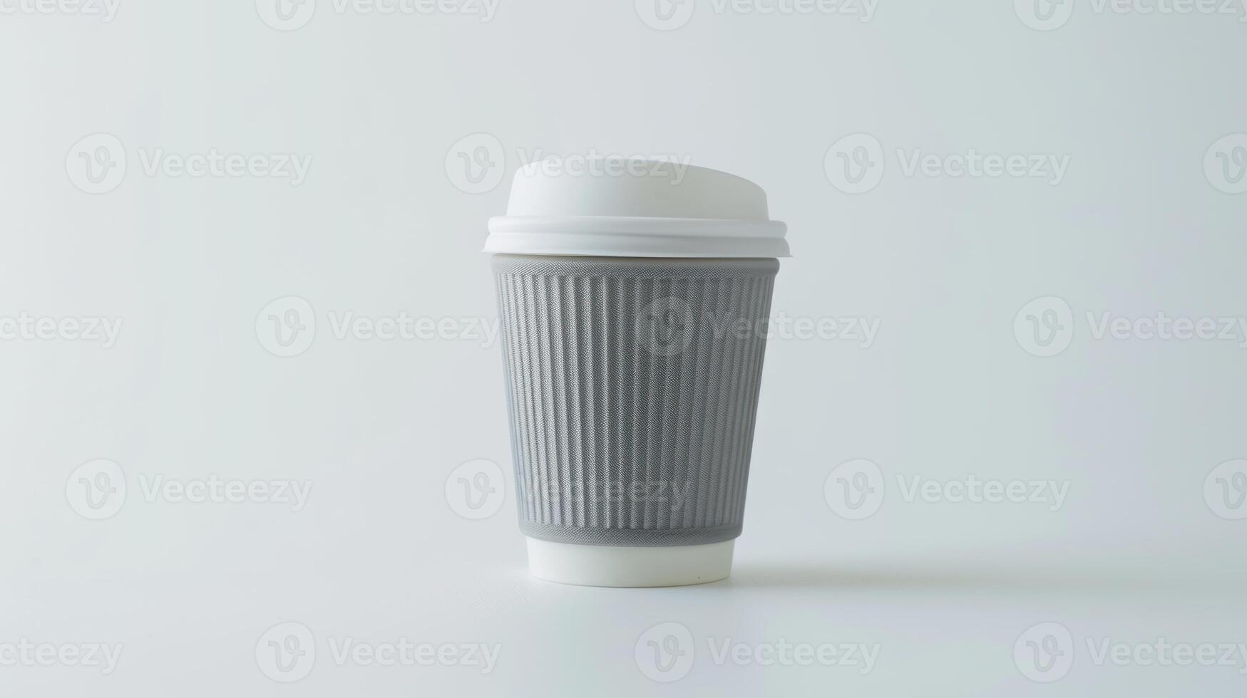 Gray paper coffee cup with a white plastic lid on a white background photo
