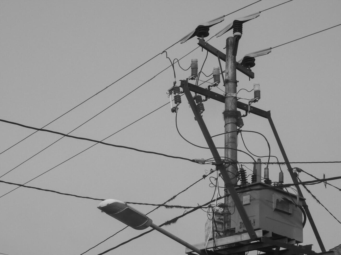 Electricity Cable Intersection, Symbol of Urban Complexity in an Increasingly Technological Landscape photo