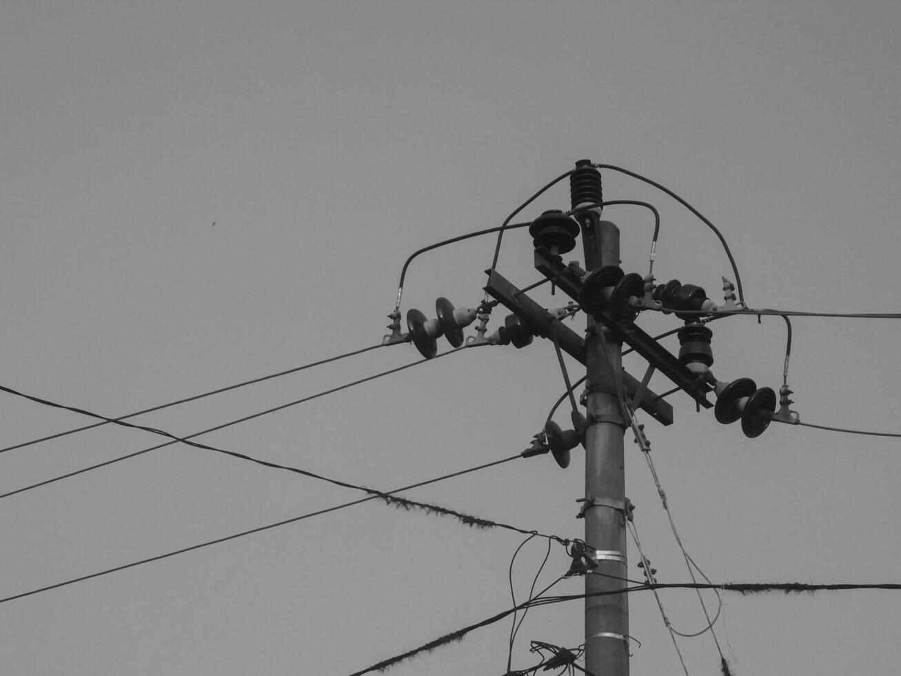 Electricity Cable Intersection, Symbol of Urban Complexity in an Increasingly Technological Landscape photo