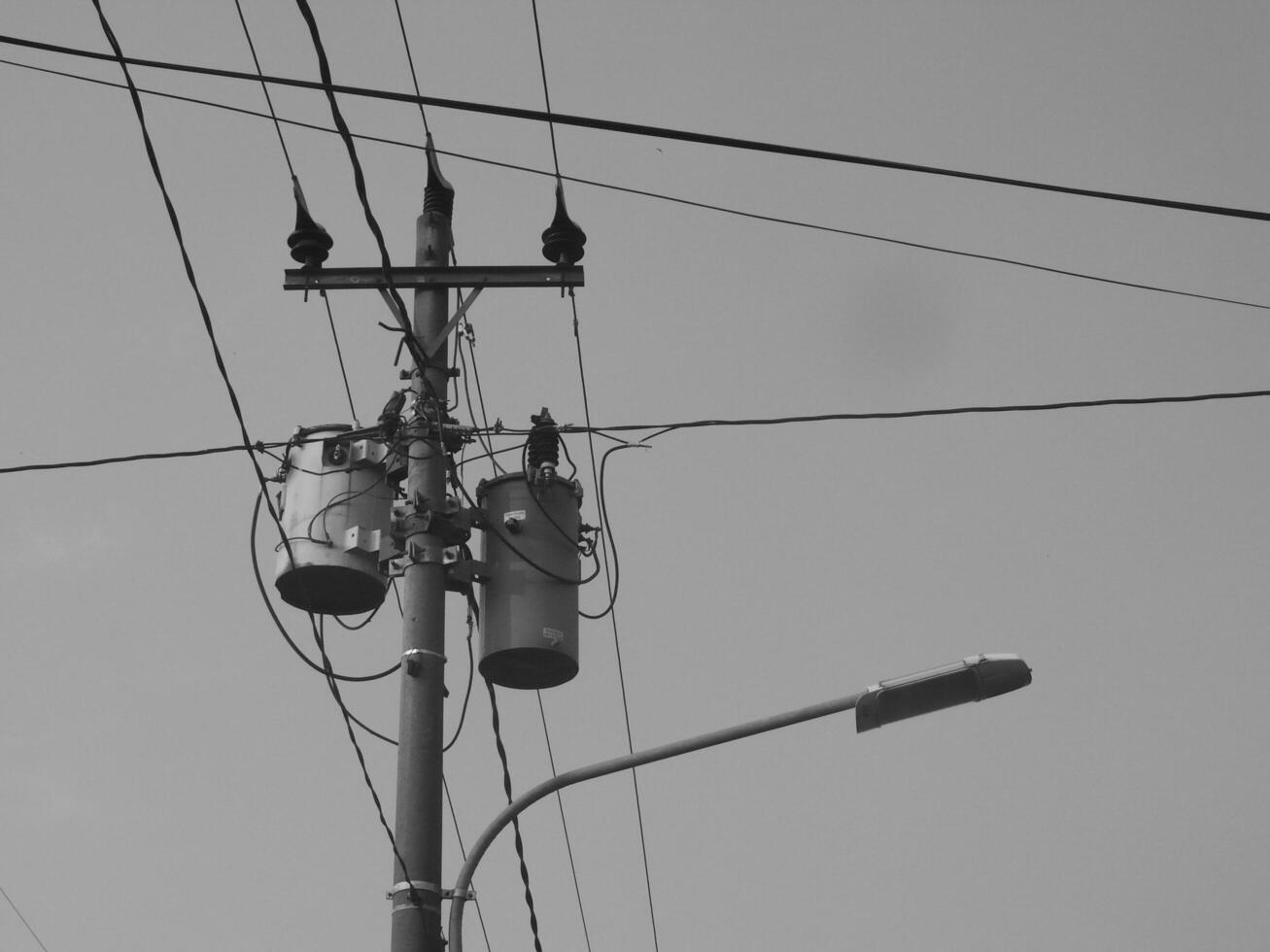 Electricity Cable Intersection, Symbol of Urban Complexity in an Increasingly Technological Landscape photo