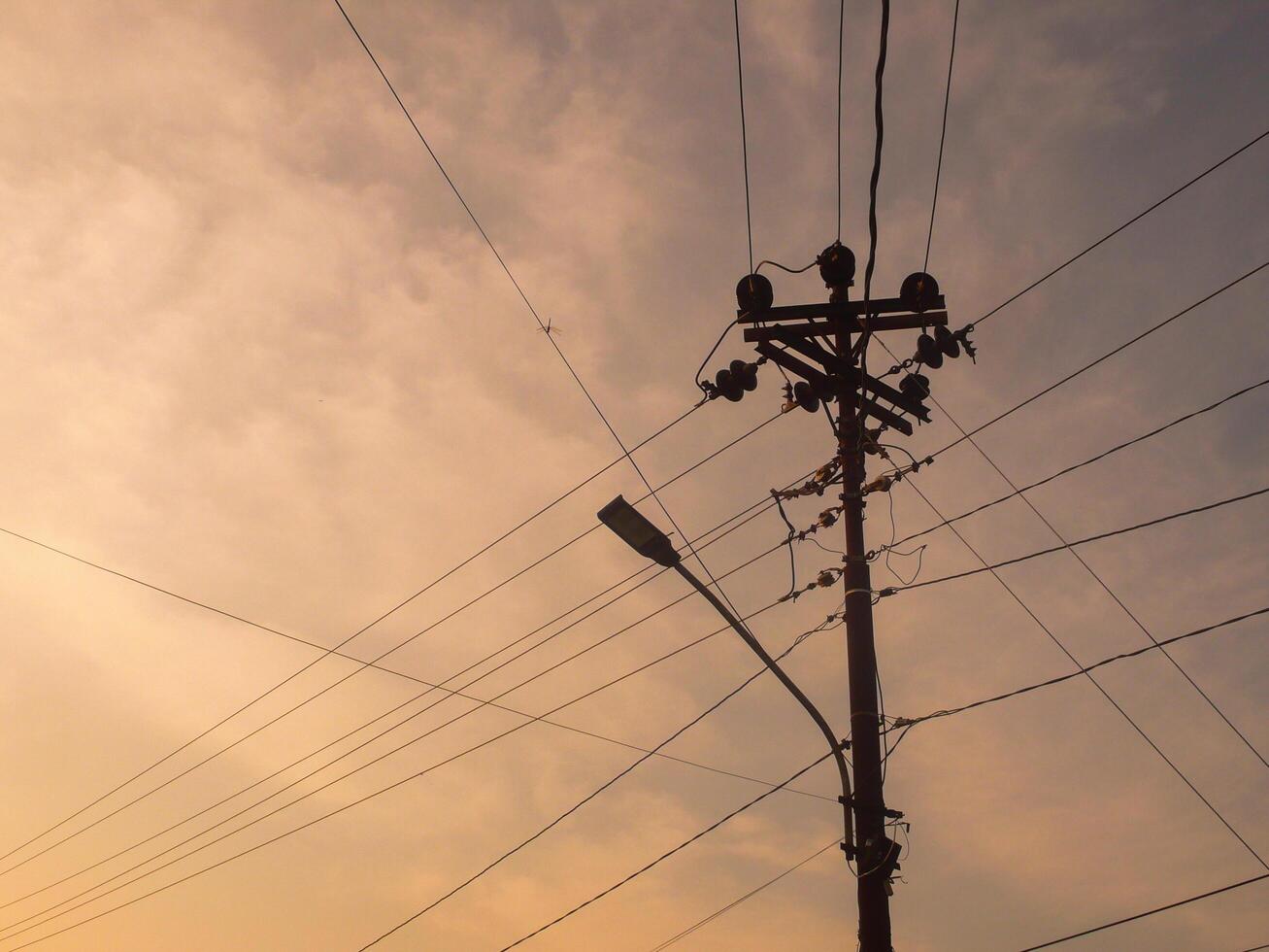 Electricity Cable Intersection, Symbol of Urban Complexity in an Increasingly Technological Landscape photo