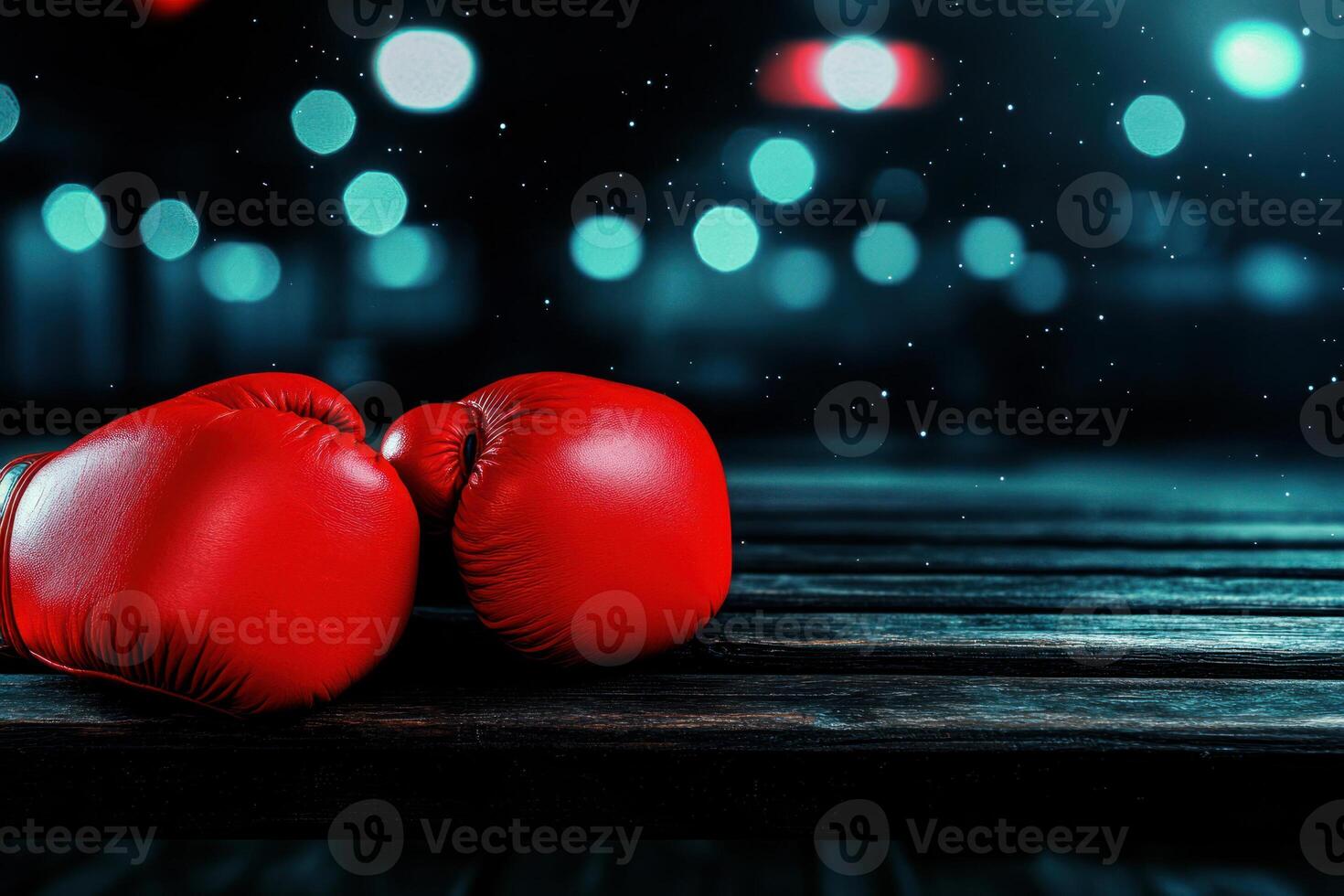 Red boxing gloves resting on a wooden bench in an empty boxing gym, strong focus on details, symbolizing combat sports and endurance photo