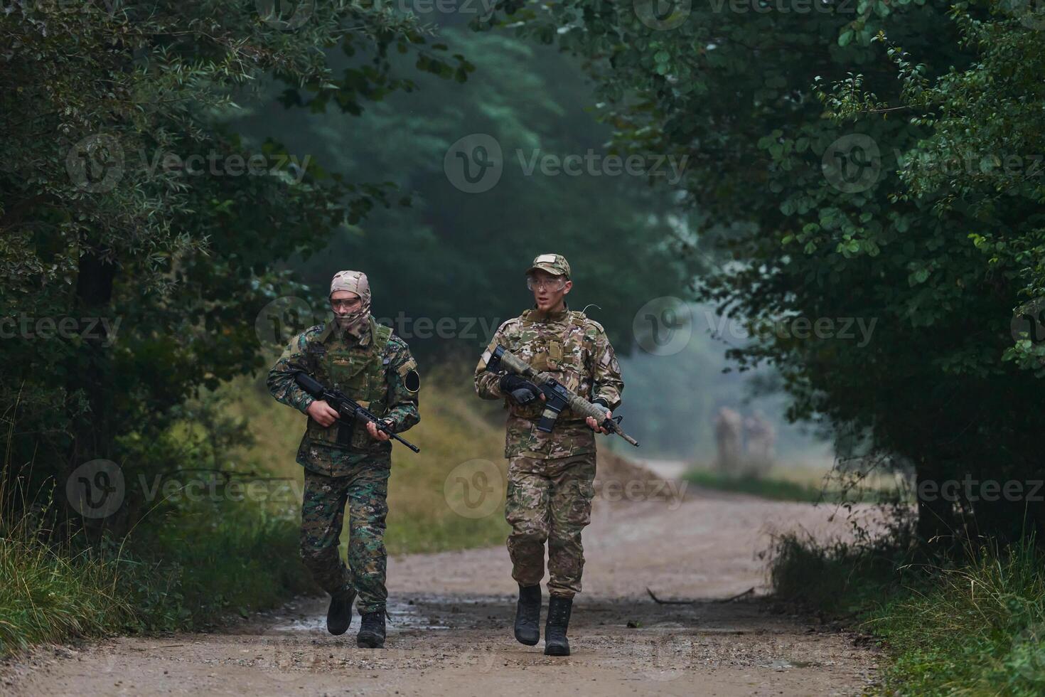 A disciplined and specialized military unit, donned in camouflage, strategically patrolling and maintaining control in a high-stakes environment, showcasing their precision, unity, and readiness for photo