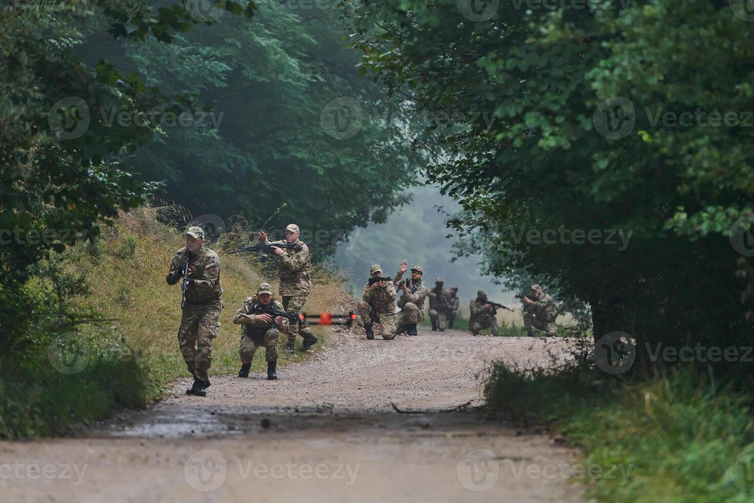 Elite military unit parading and securing the forest, utilizing drones for terrain scanning and reconnaissance, showcasing their advanced skills and specialized training in high risk operations photo