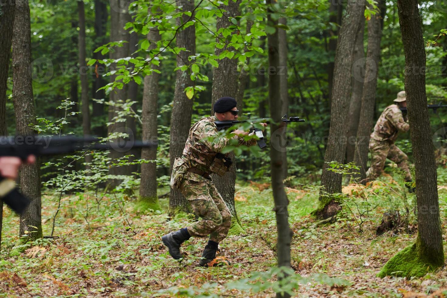 A disciplined and specialized military unit, donned in camouflage, strategically patrolling and maintaining control in a high-stakes environment, showcasing their precision, unity, and readiness for photo
