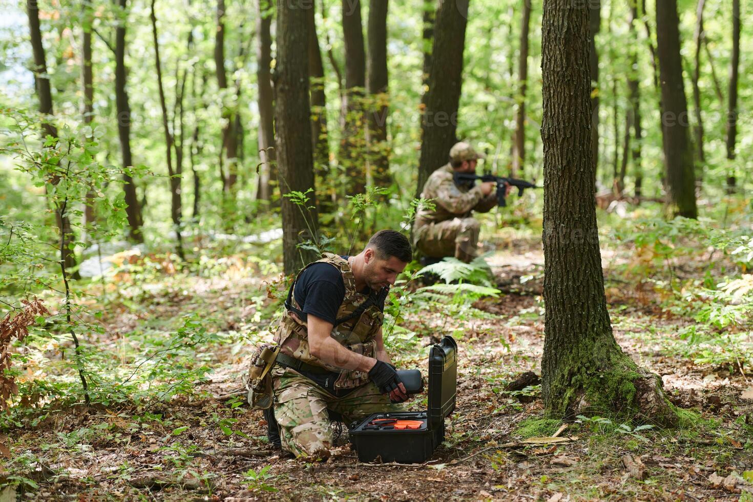 A specialized military antiterrorist unit conducts a covert operation in dense, hazardous woodland, demonstrating precision, discipline, and strategic readiness photo
