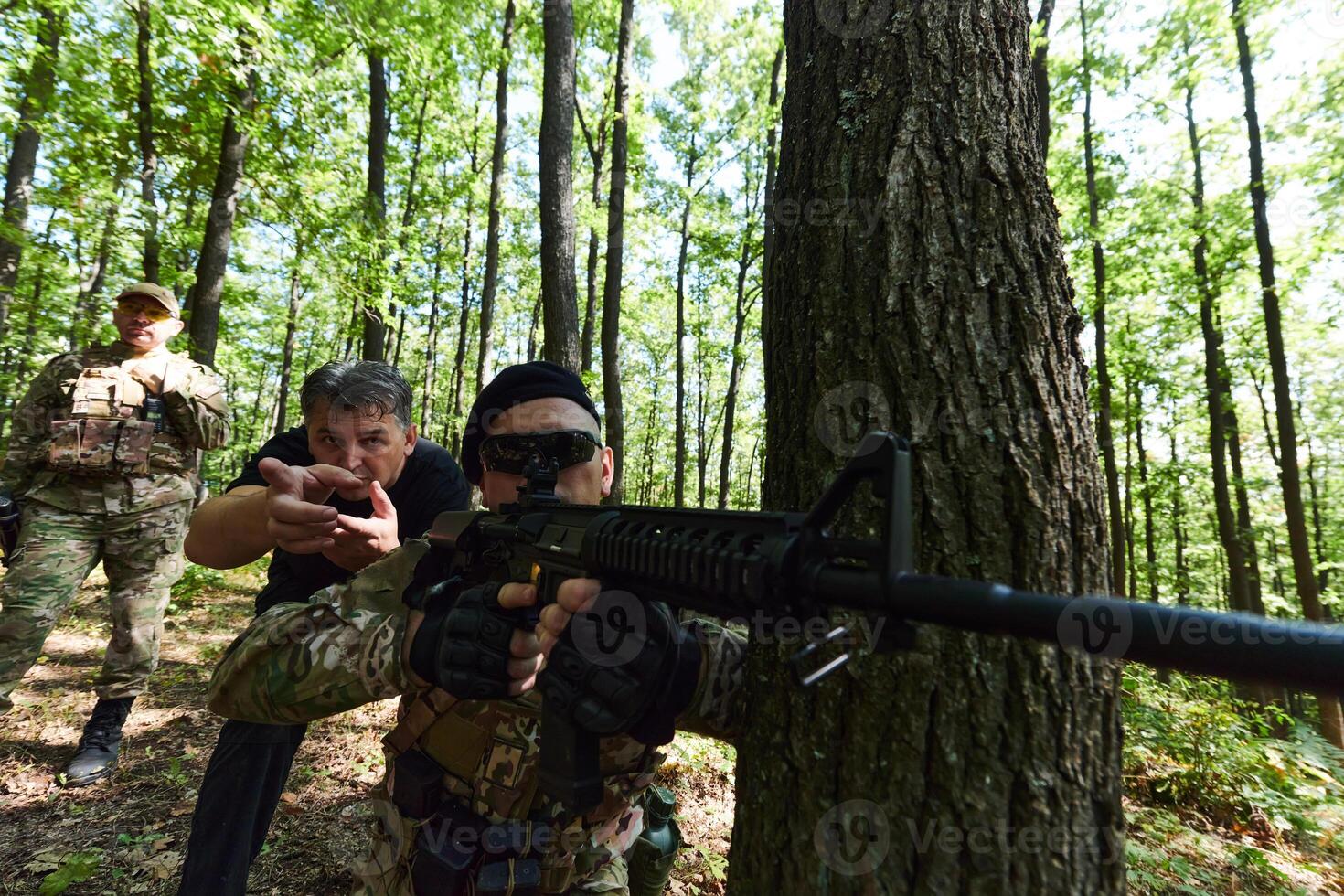 A disciplined and specialized military unit, donned in camouflage, strategically patrolling and maintaining control in a high-stakes environment, showcasing their precision, unity, and readiness for photo