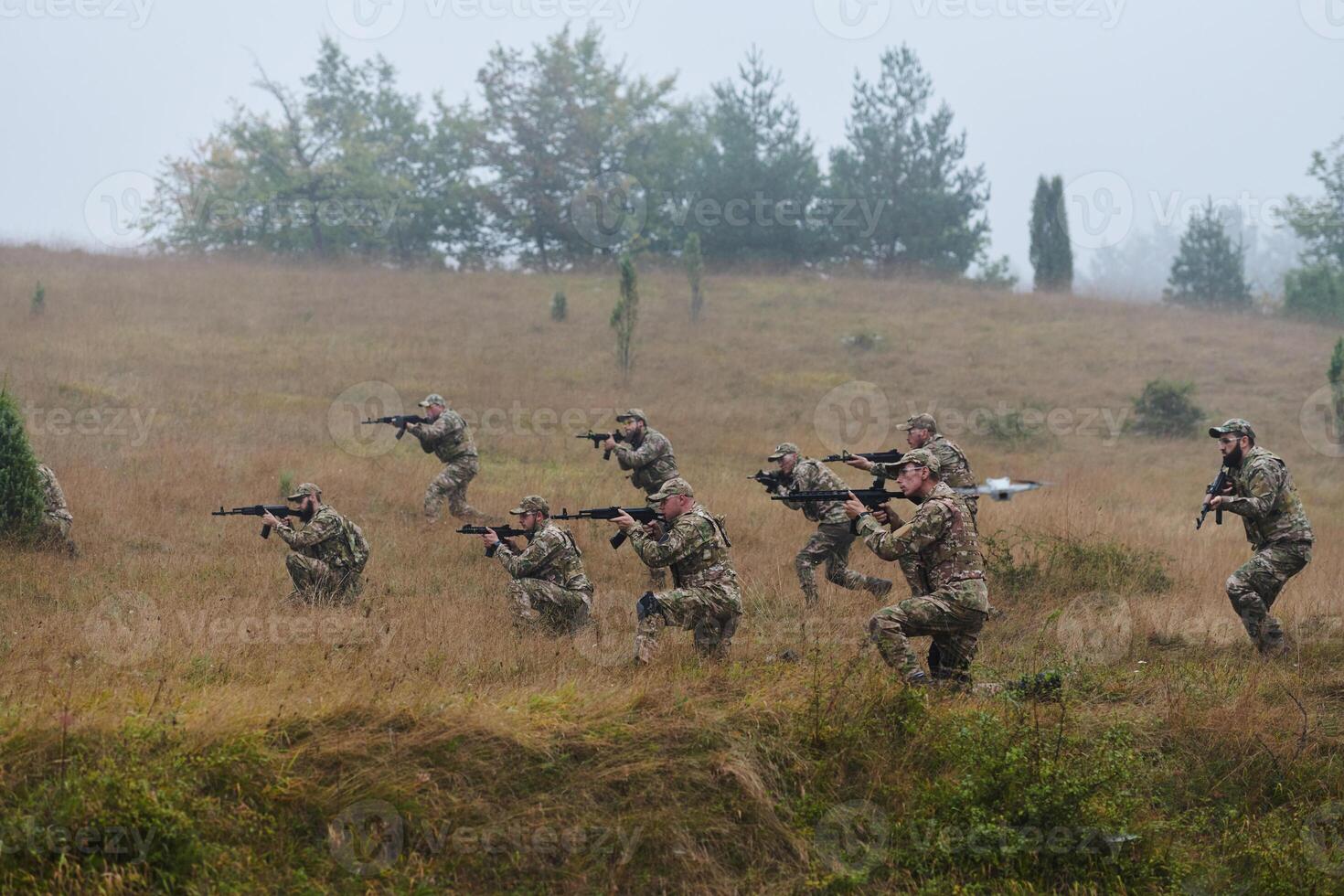 A disciplined and specialized military unit, donned in camouflage, strategically patrolling and maintaining control in a high-stakes environment, showcasing their precision, unity, and readiness for photo