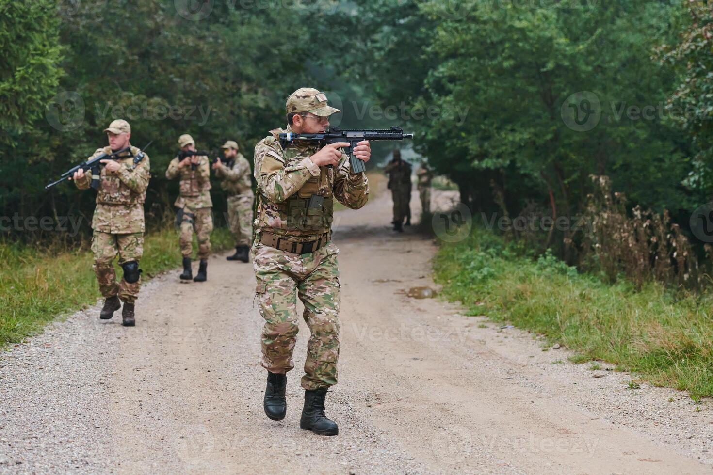 A disciplined and specialized military unit, donned in camouflage, strategically patrolling and maintaining control in a high-stakes environment, showcasing their precision, unity, and readiness for photo