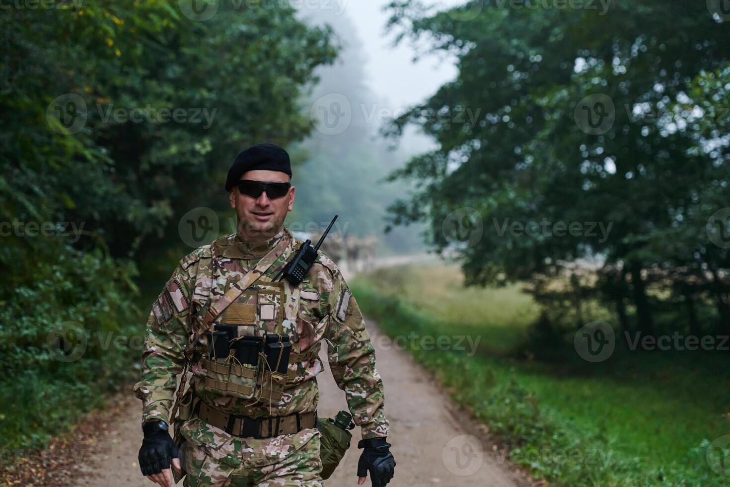 Elite soldier exudes focused determination and readiness, geared up for a perilous military operation, capturing the essence of courage and professionalism in the face of imminent danger photo