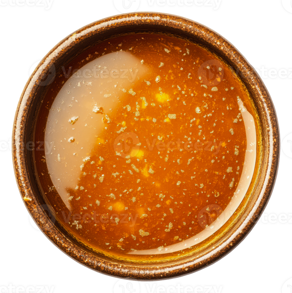 Golden honey in a brown bowl png