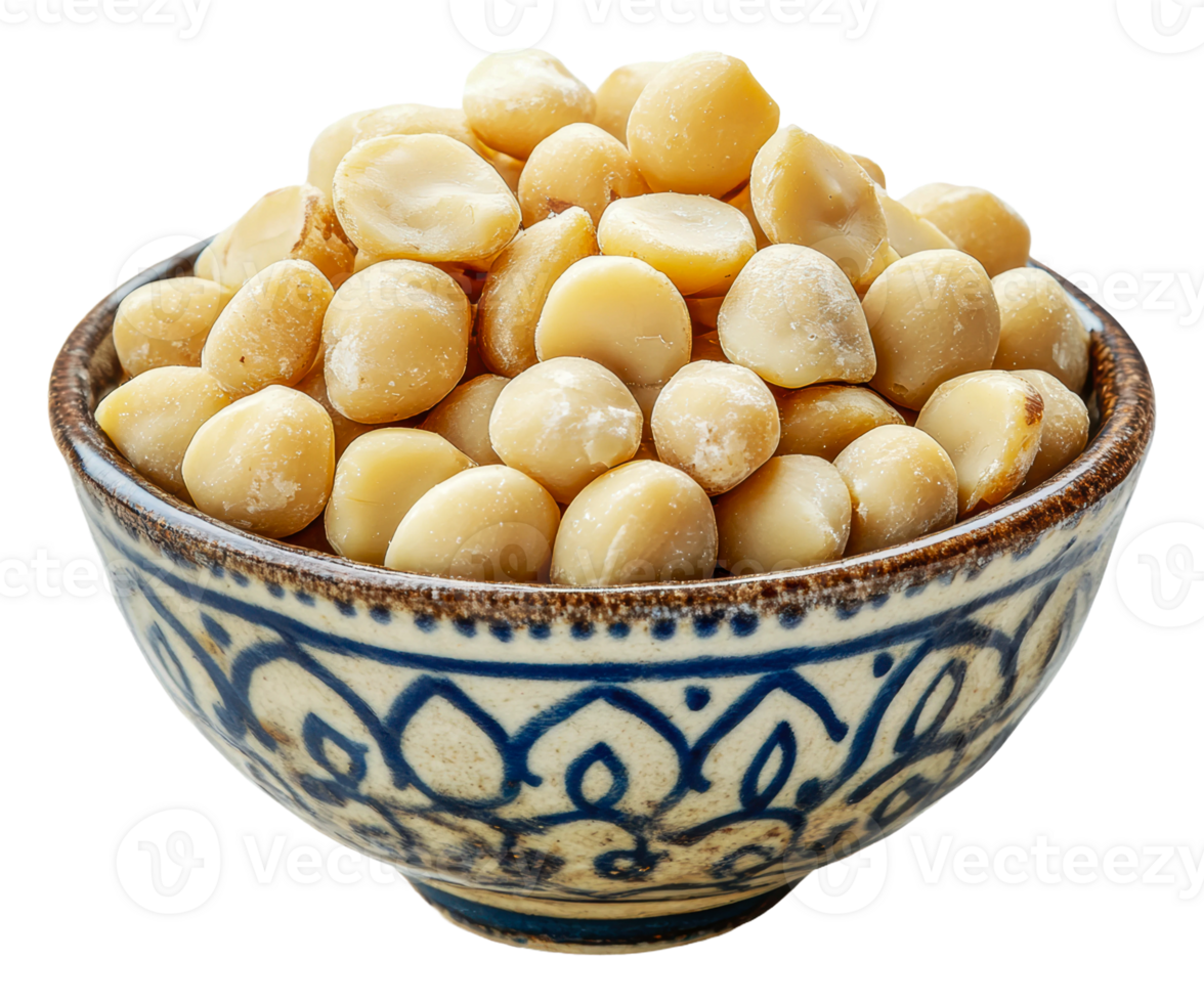 Macadamia nuts in a decorative bowl on a table png