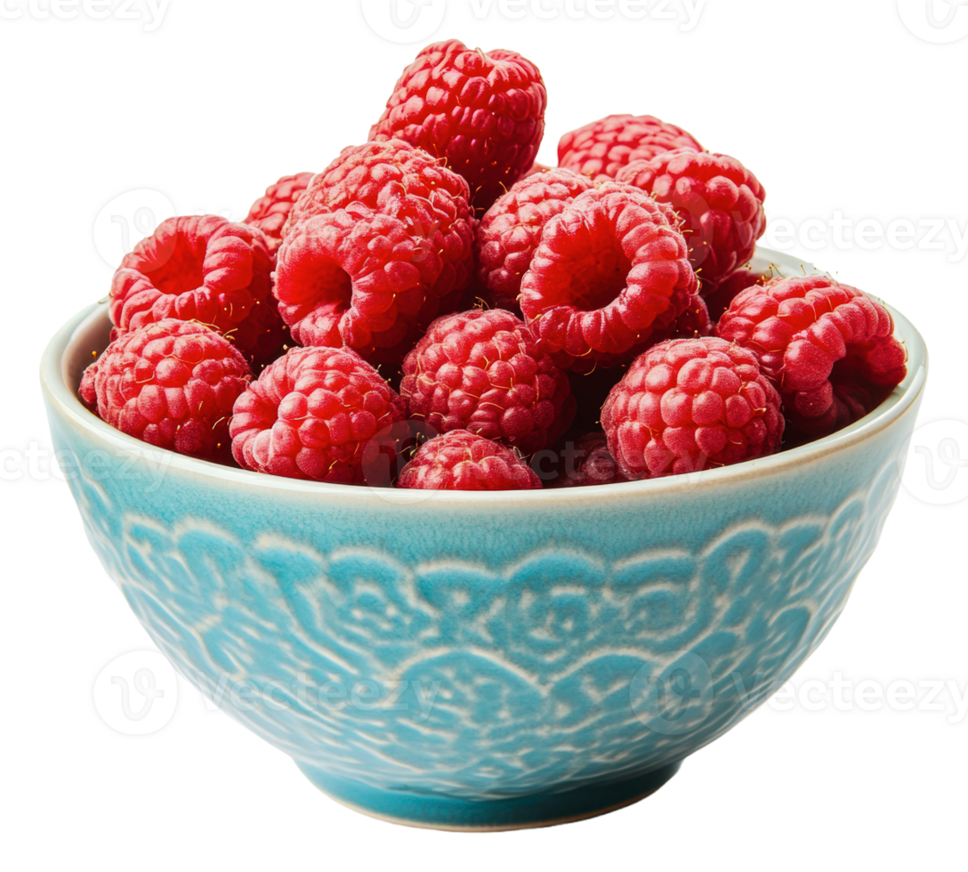 Fresh raspberries in a decorative blue bowl png