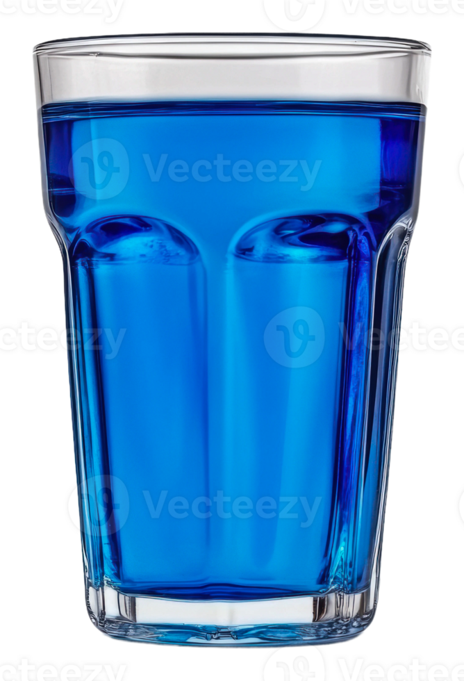 Bright blue drink in a clear glass on a table, cut out - stock . png