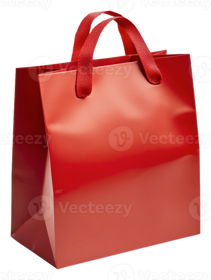 Bright red shopping bag resting on a flat surface, cut out - stock . png
