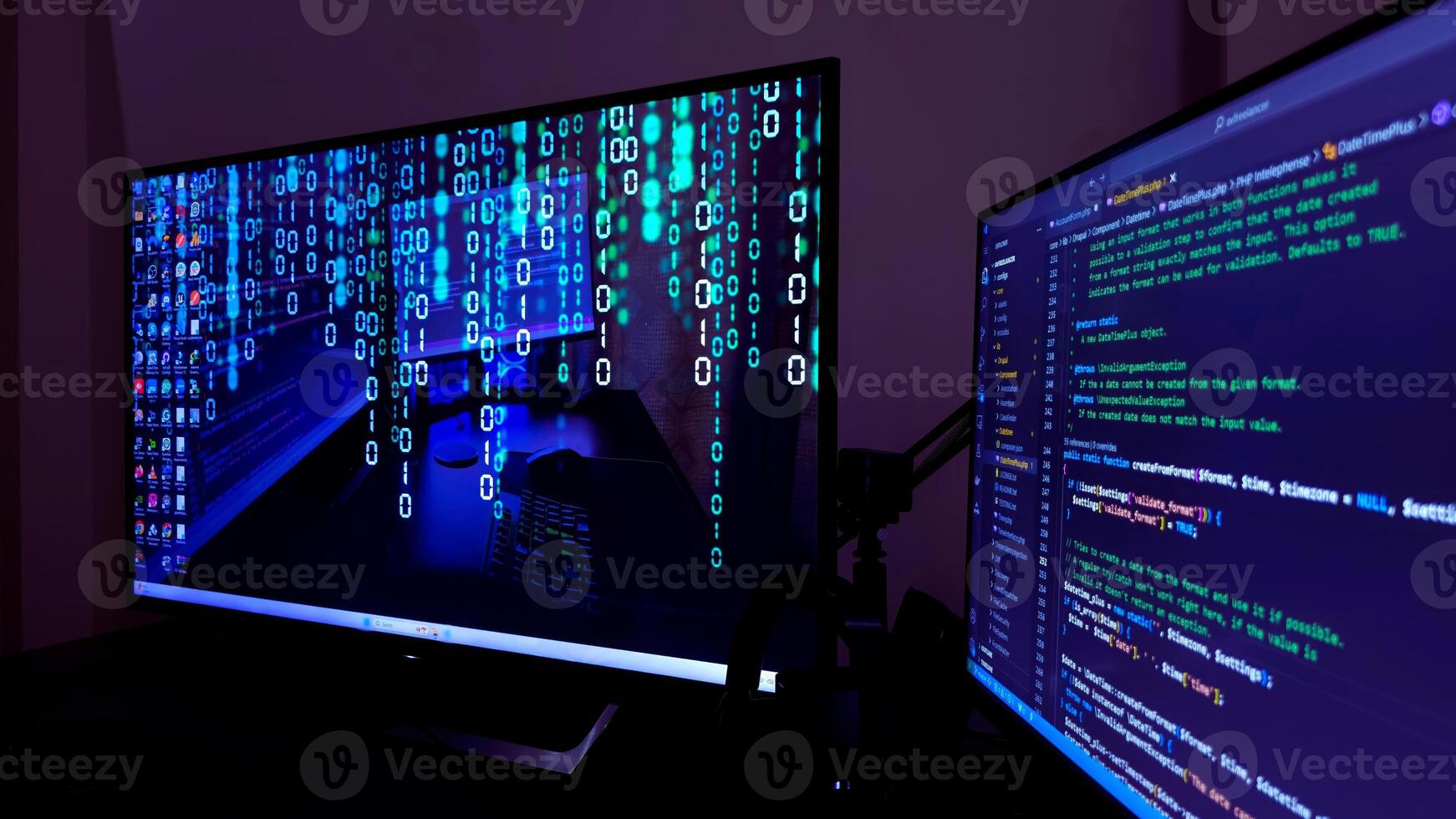 Two monitors with a computer screen on each photo