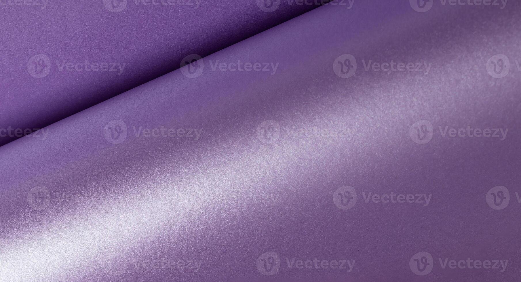 Glossy paper background with a shiny, smooth texture and subtle glitter. Luxurious surface with a photo