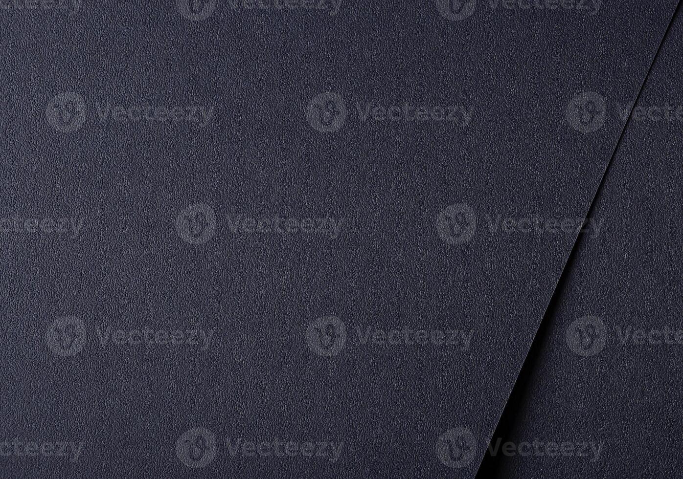 Dark paper background with a smooth, abstract texture and elegant pattern. Rugged yet stylish, the photo
