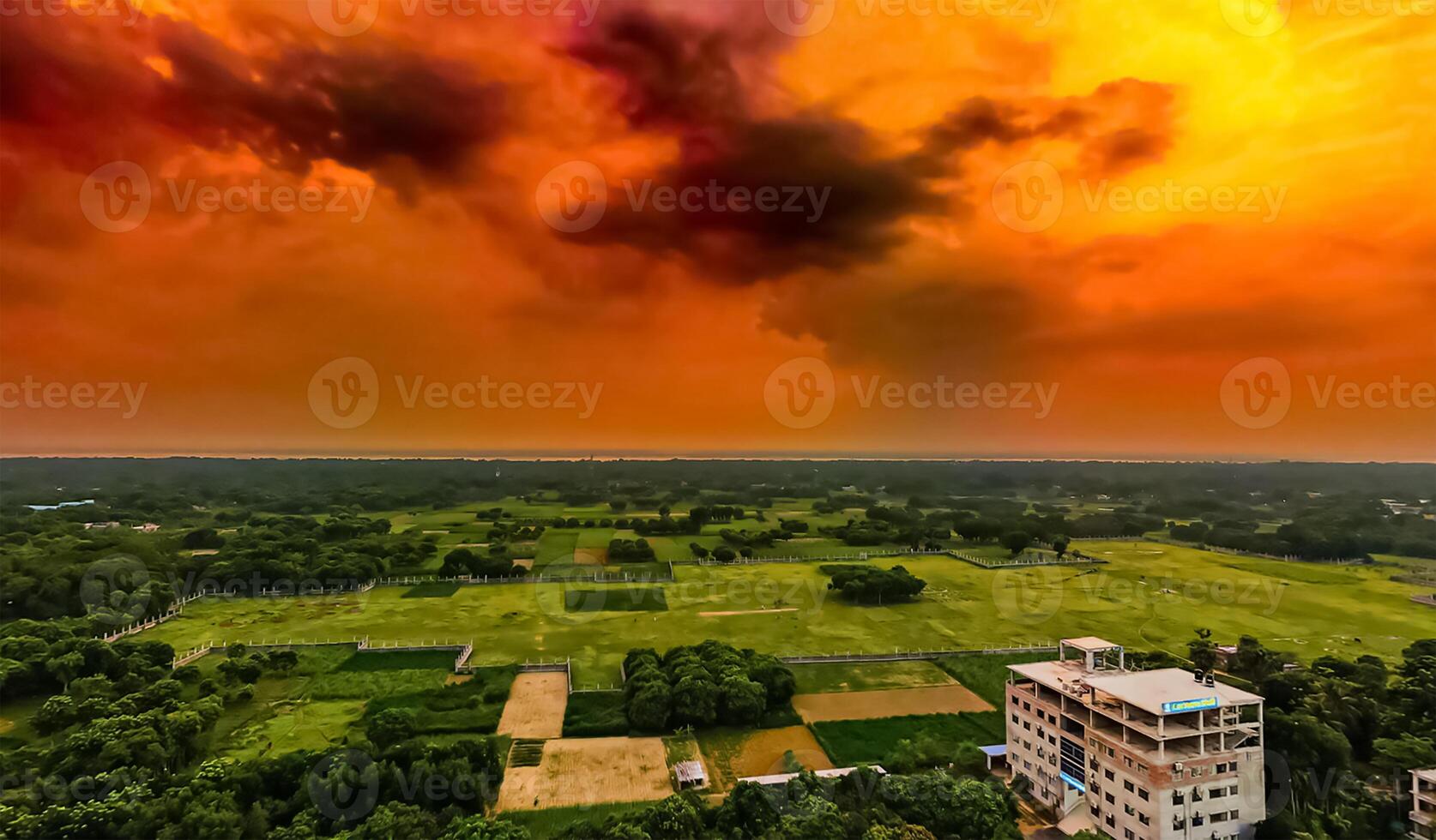 A view of the sky from above with a red sky photo