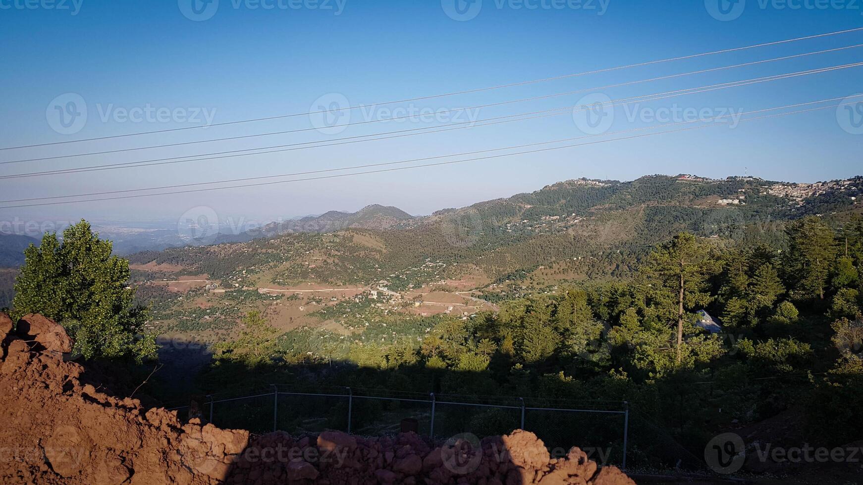 Beautiful Over the Mountain View with bunch of trees photo