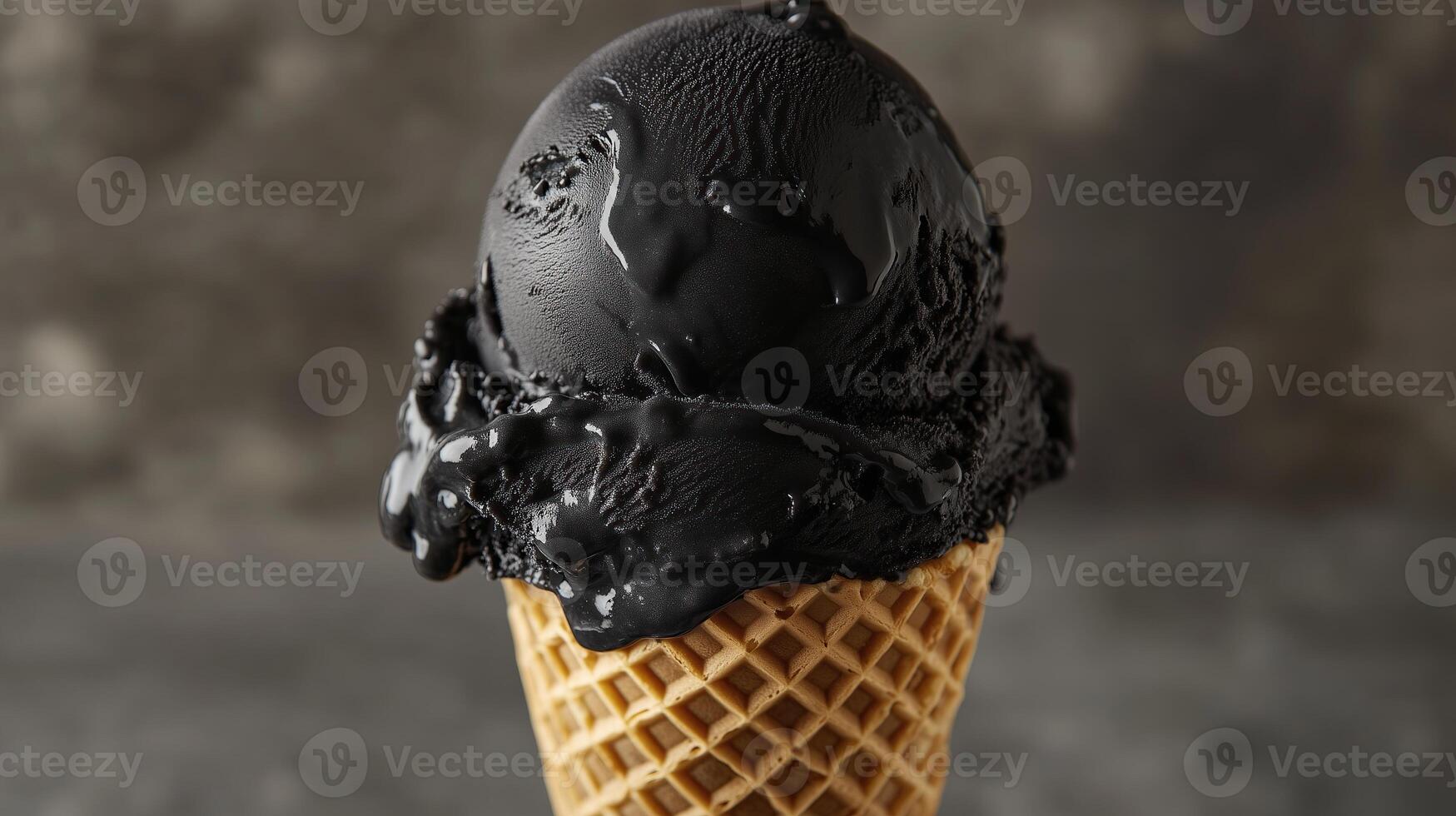 Close-up of black ice cream in waffle cone photo