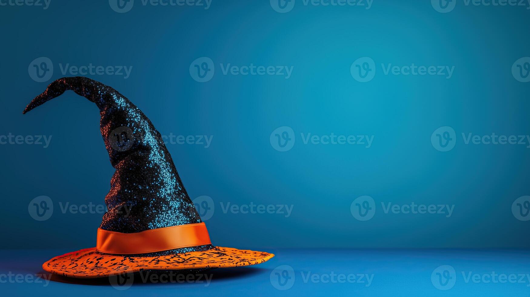 Halloween Witch Hat on a blue background photo
