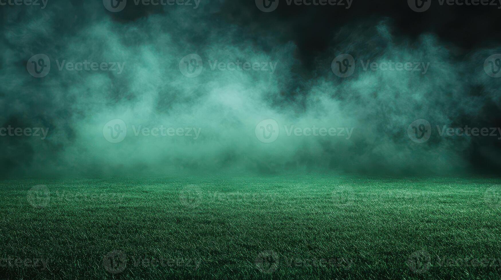 Green grass field with smoke and fog photo