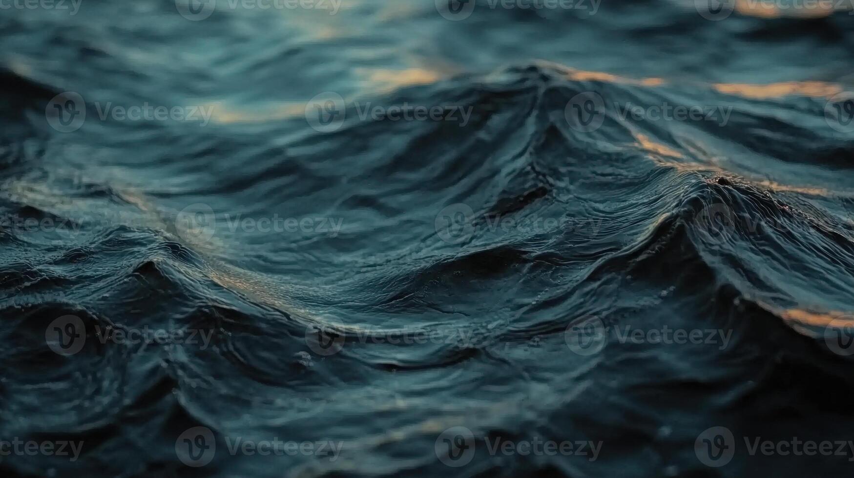 A close up of a wave in the ocean photo