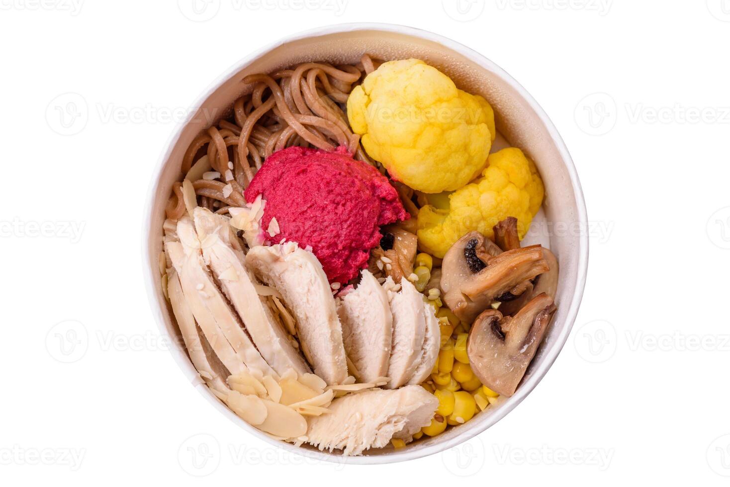 Asian dish with sliced chicken fillet, buckwheat noodles, soy sauce photo