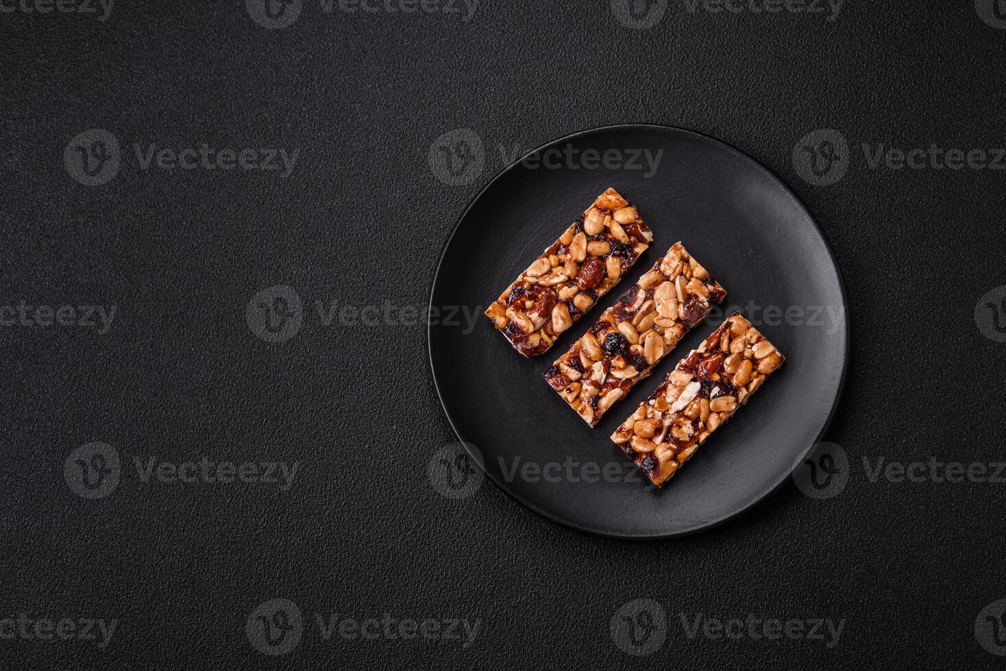Delicious sweet nutrition bars with nuts, dried berries gluten free photo