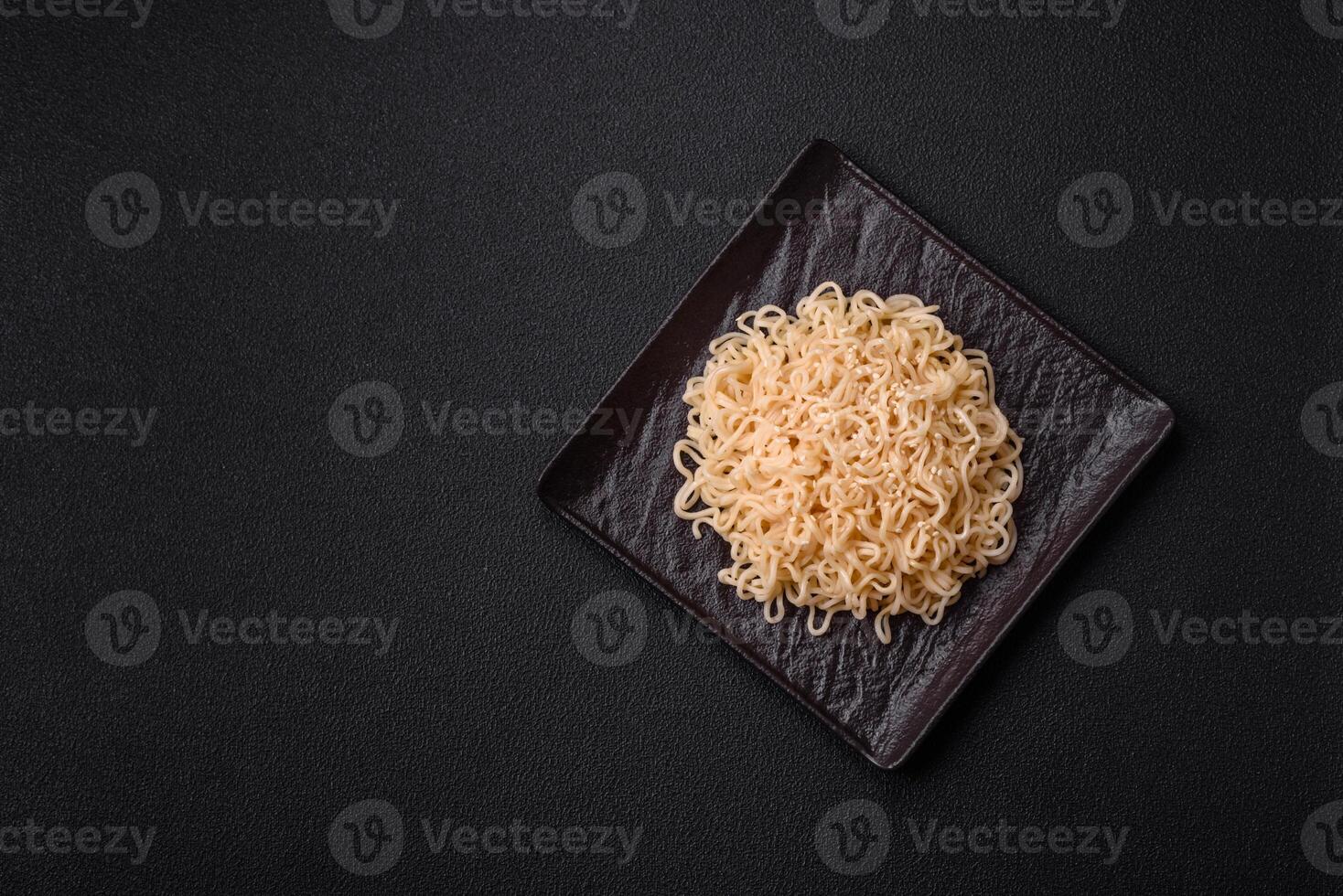 Rice noodles with mushrooms, vegetables, spices and herbs photo