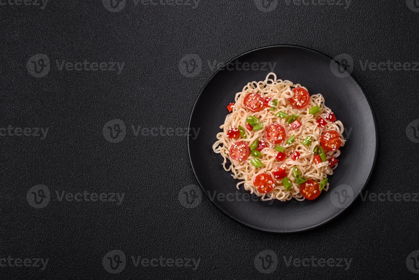 Rice noodles with mushrooms, vegetables, spices and herbs photo
