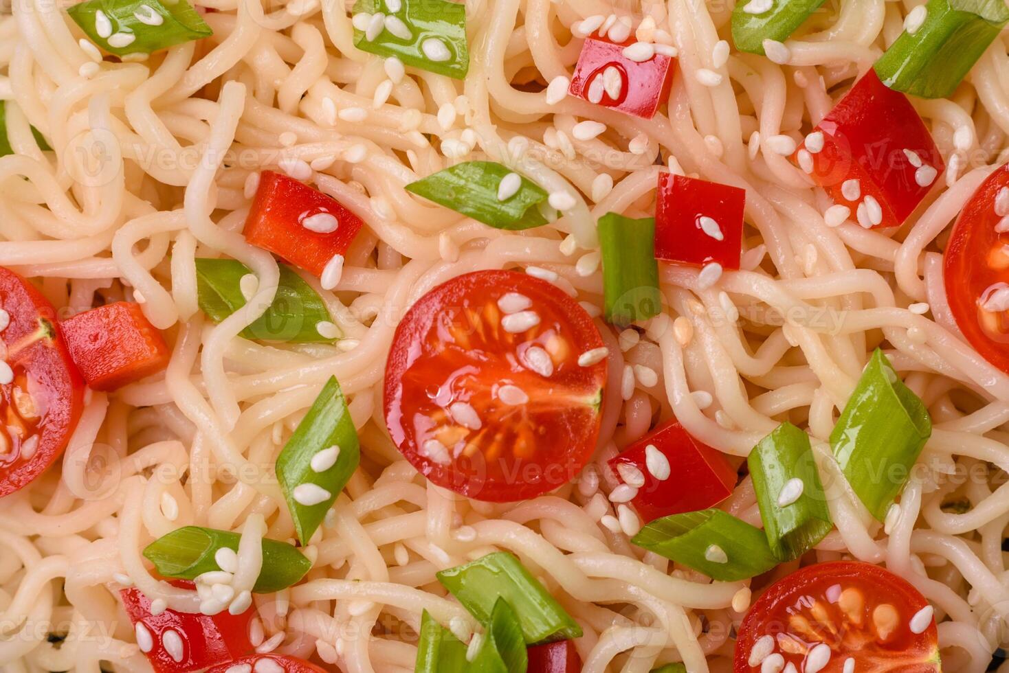 Rice noodles with mushrooms, vegetables, spices and herbs photo