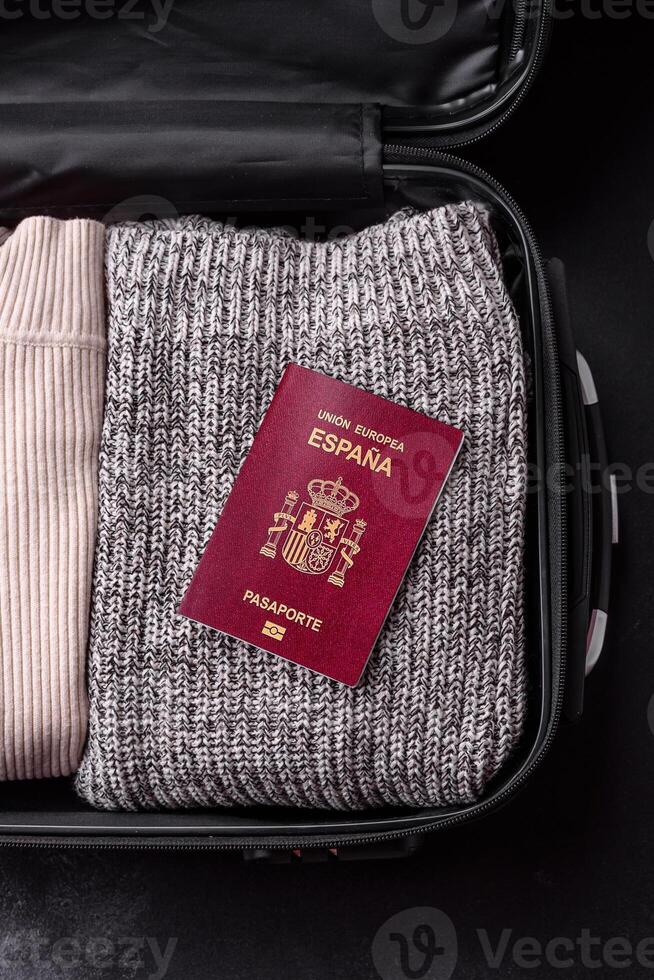 International passport of a citizen of Spain on a suitcase photo