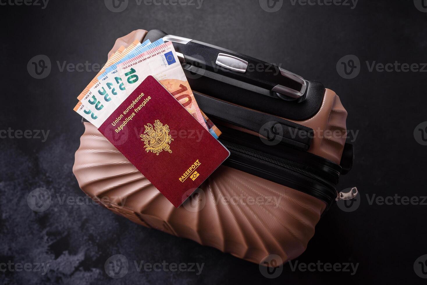 International passport of a French citizen on a suitcase photo