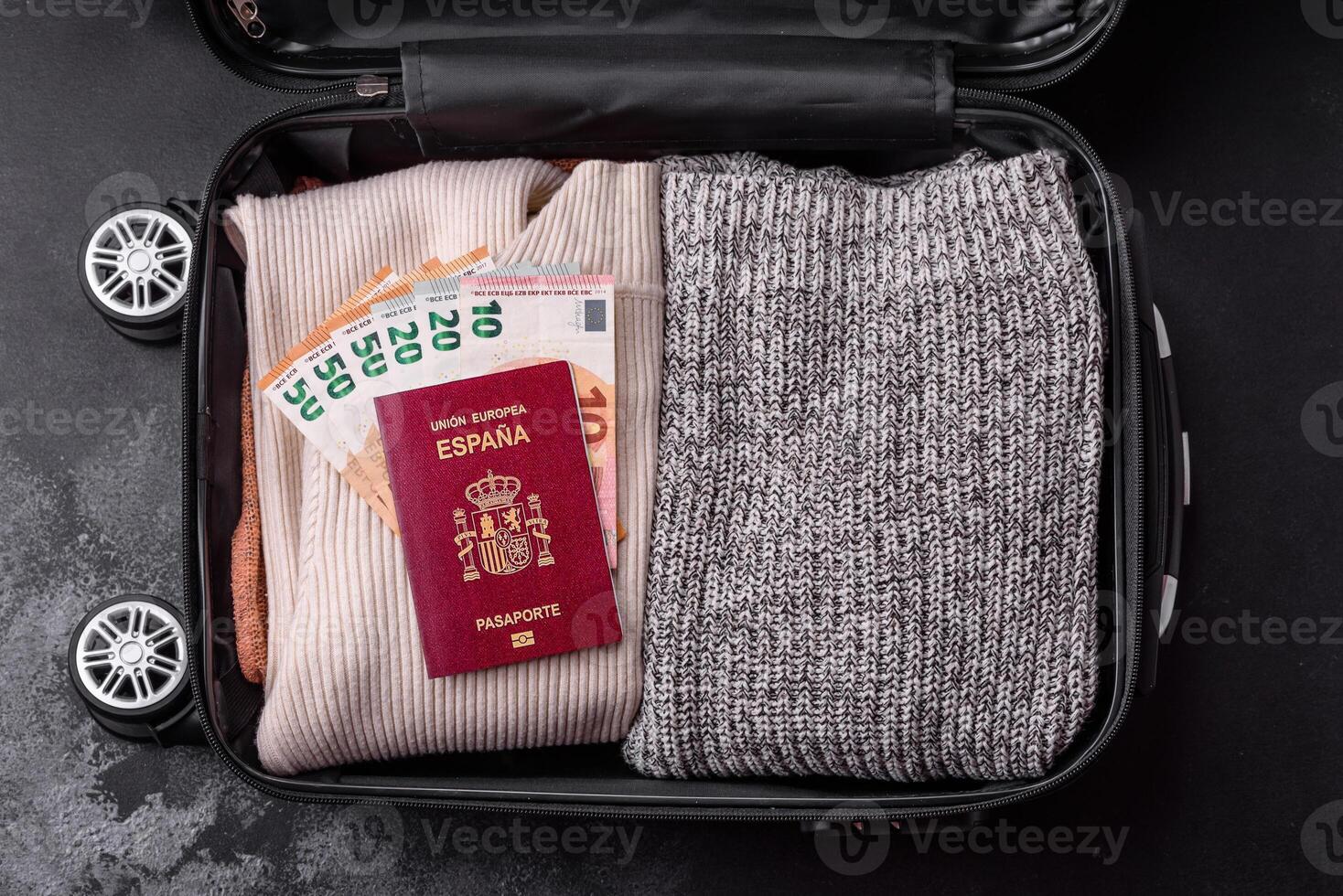 International passport of a citizen of Spain on a suitcase photo