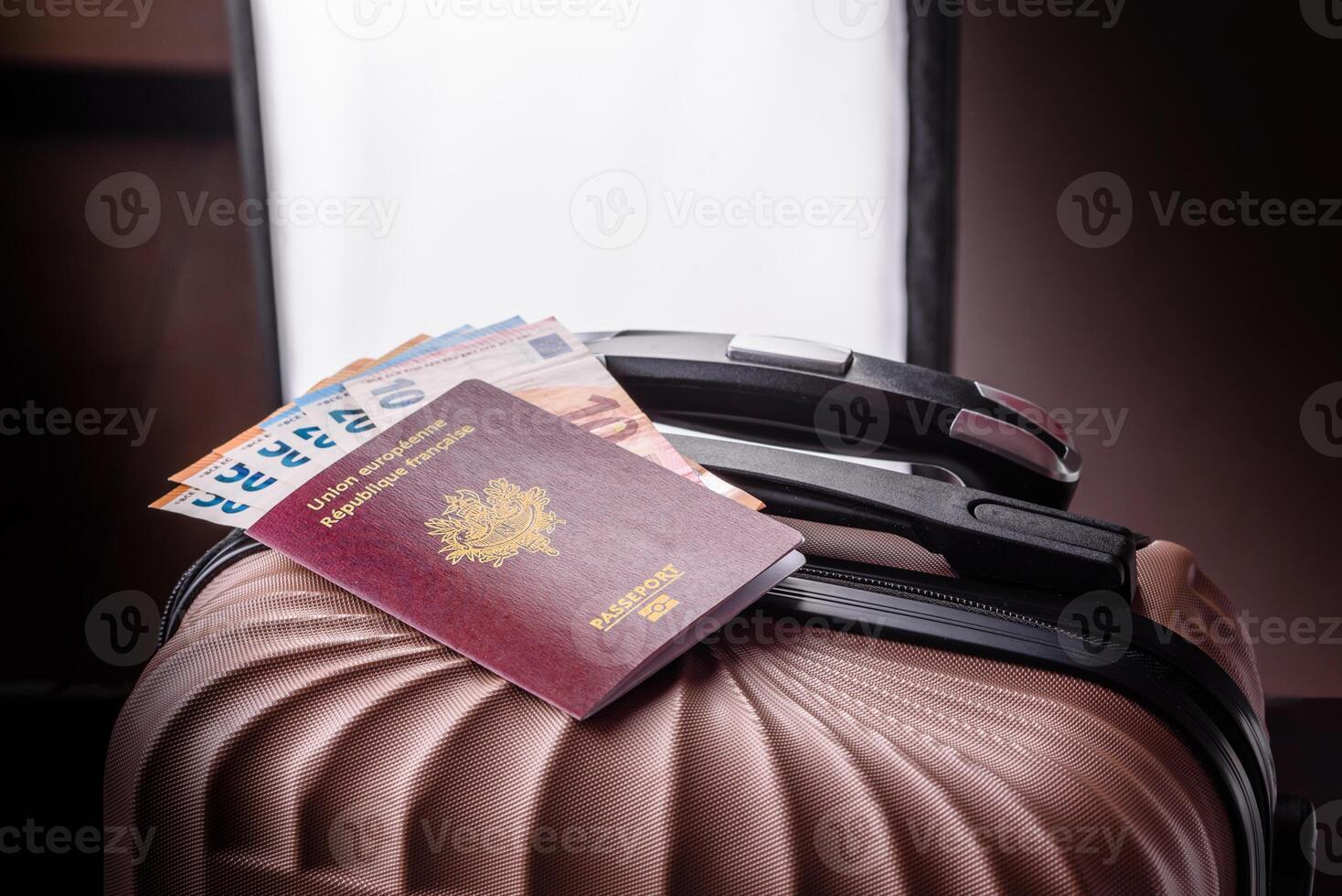 International passport of a French citizen on a suitcase photo
