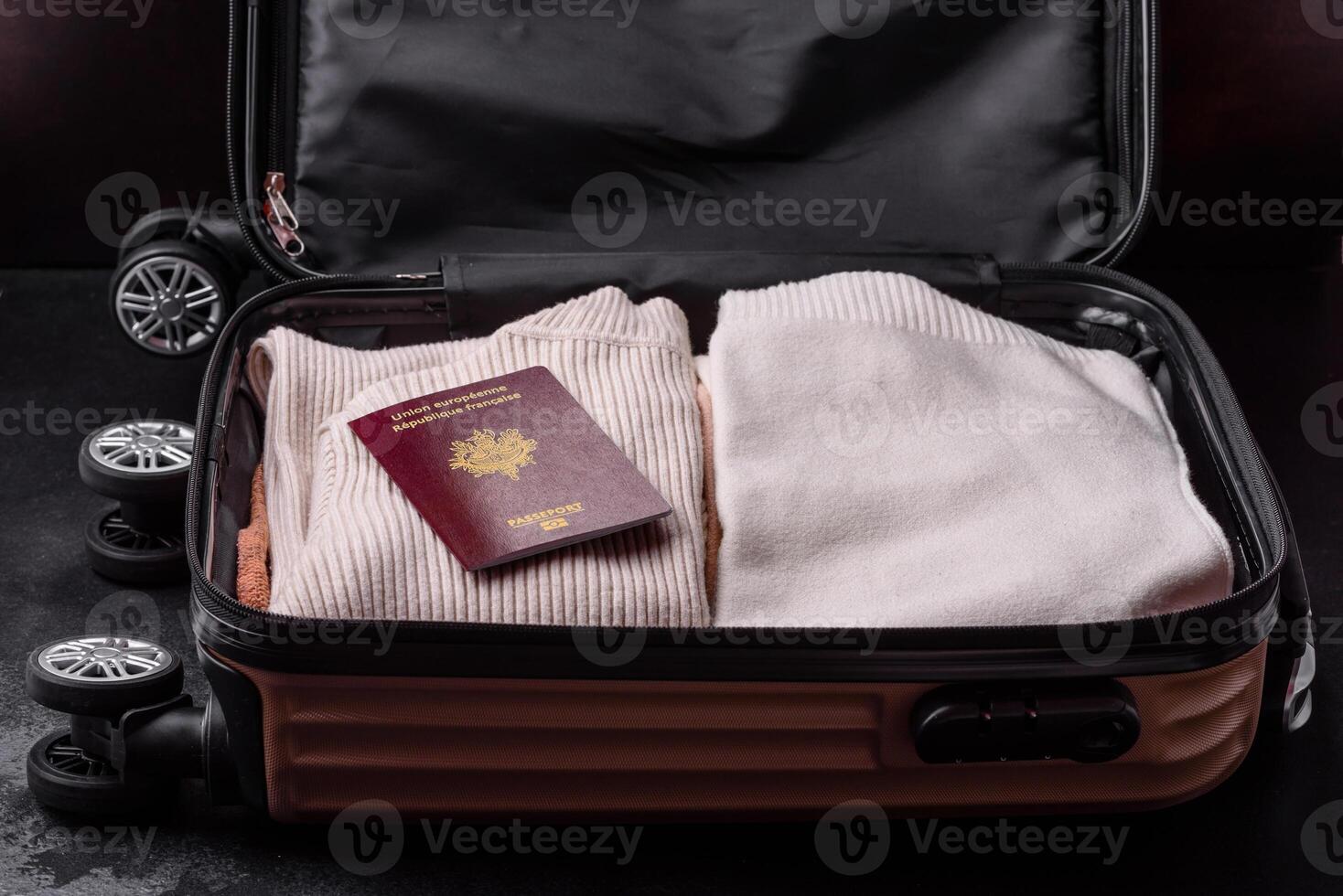 International passport of a French citizen on a suitcase photo