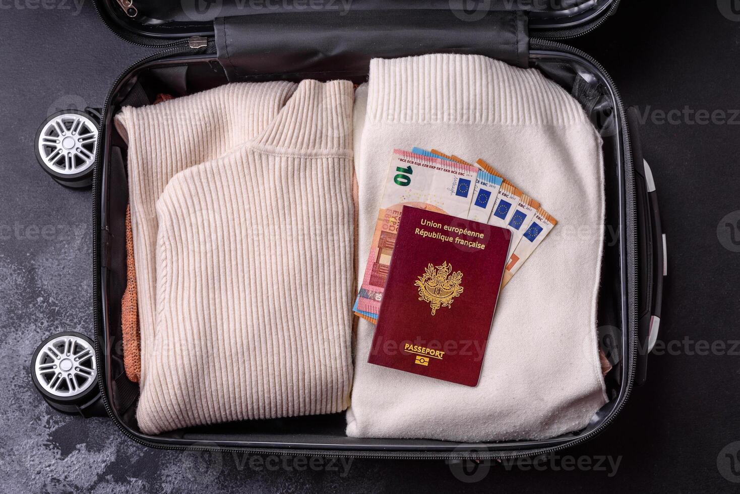 International passport of a French citizen on a suitcase photo