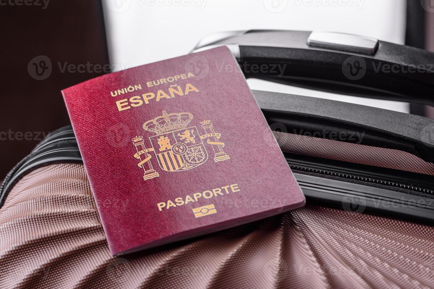 International passport of a citizen of Spain on a suitcase photo