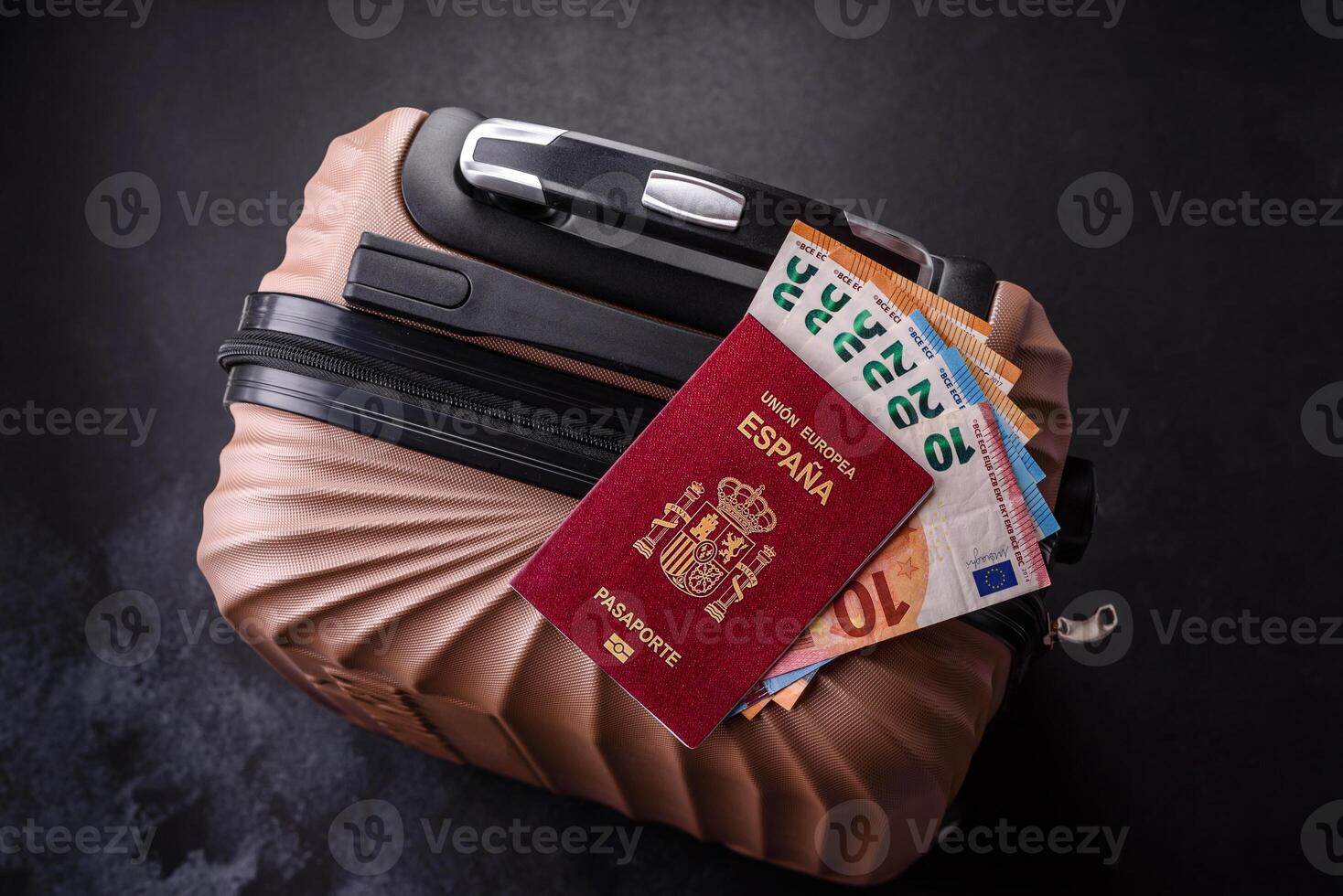 International passport of a citizen of Spain on a suitcase photo