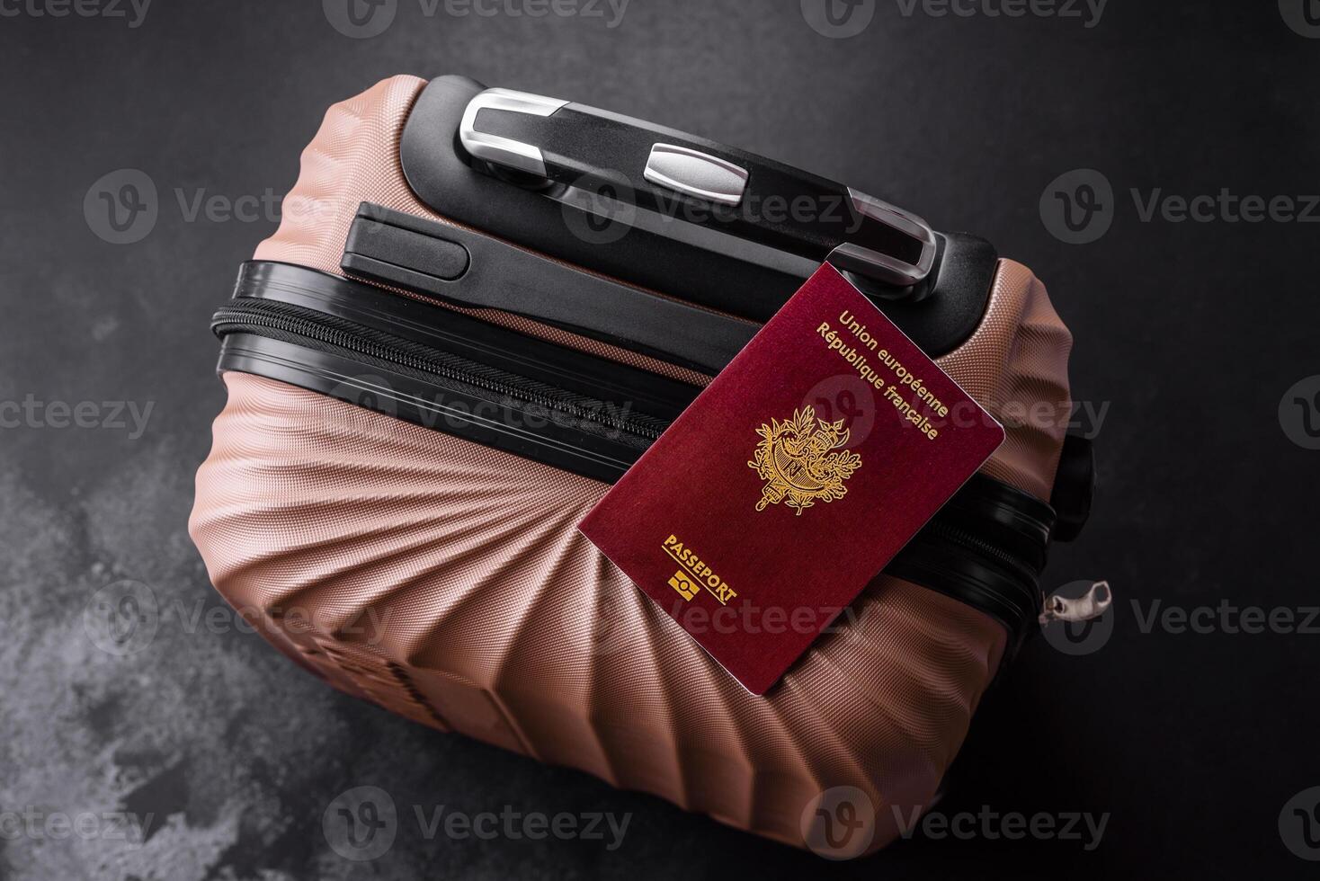 International passport of a French citizen on a suitcase photo